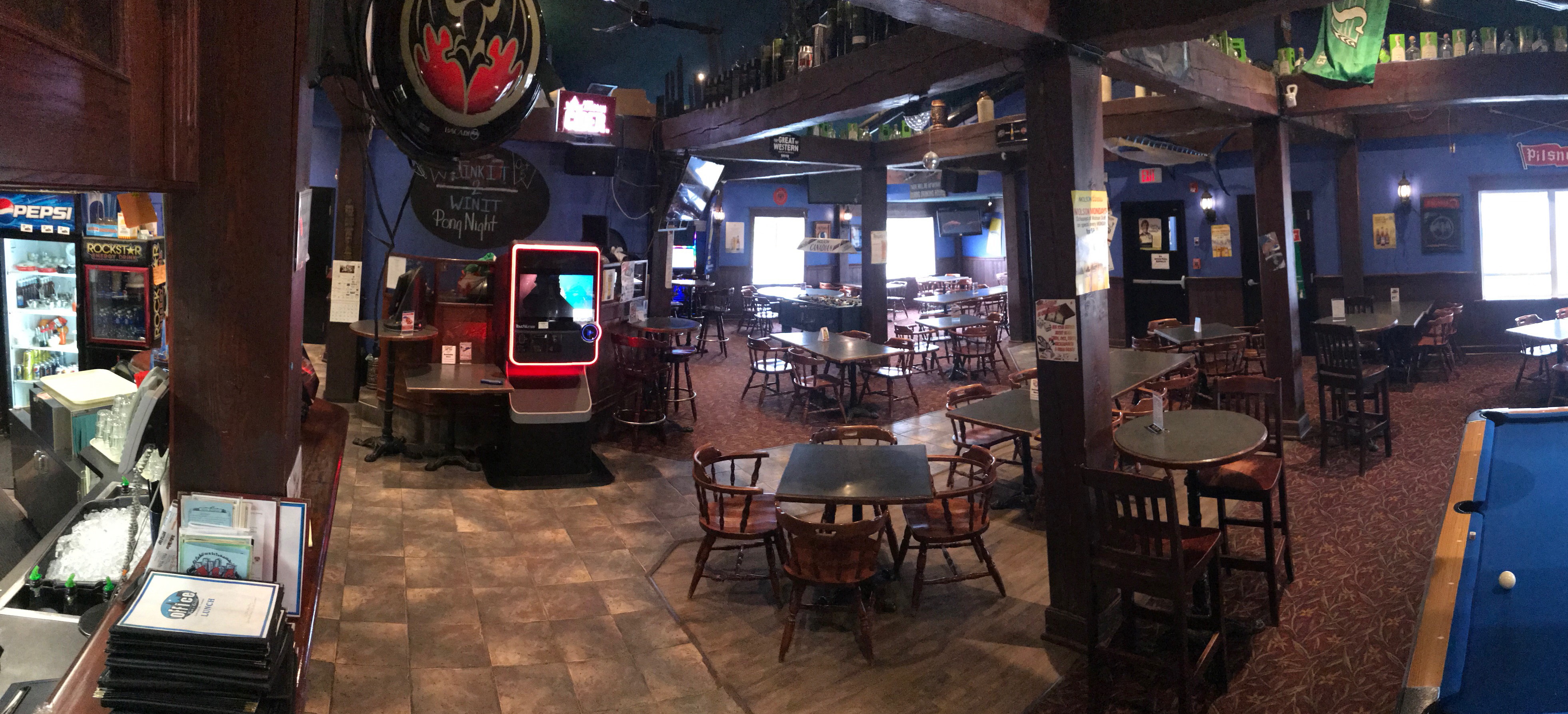 Bar is Upstairs, Featuring VLTs, Pool Table, Foozball, Darts, 5 Big Screen TVs.